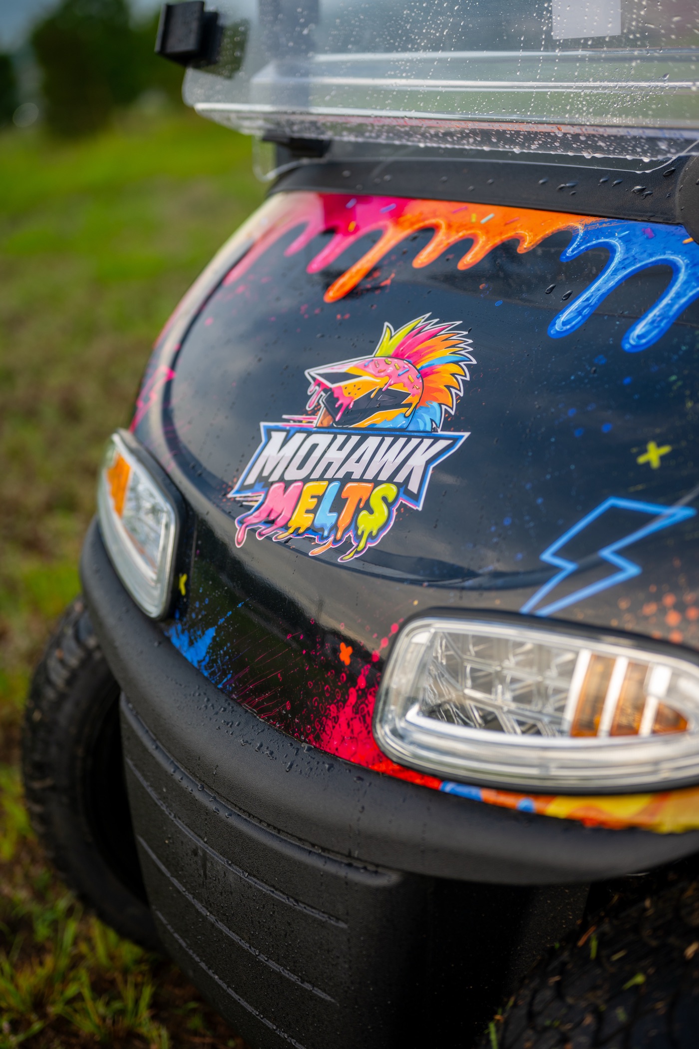 Front of the cart — Mohawk Melts logo on the black splatter wrap