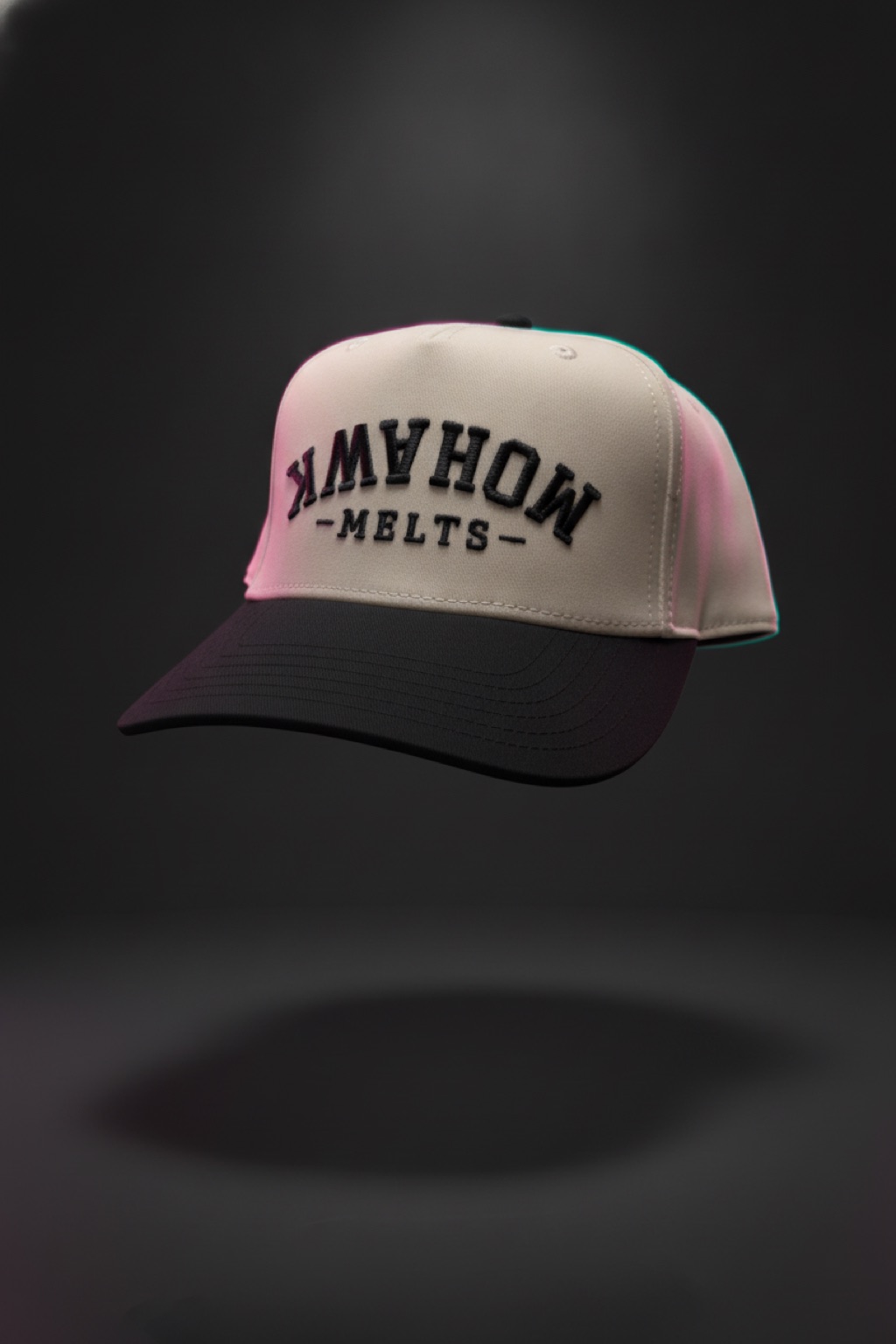 Mohawk Melts Snapback — cream hat with upside-down MOHAWK embroidery — $34.95, one size
